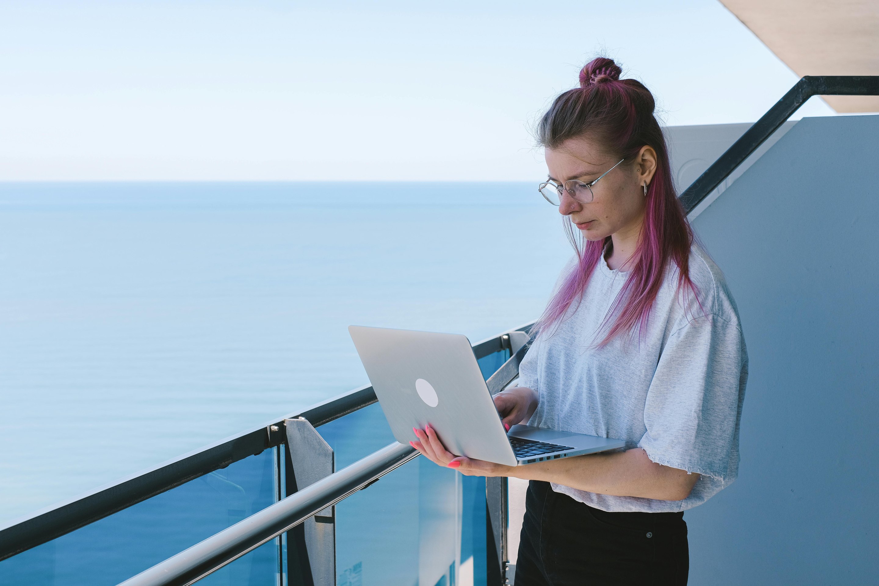 Person working remotely on laptop